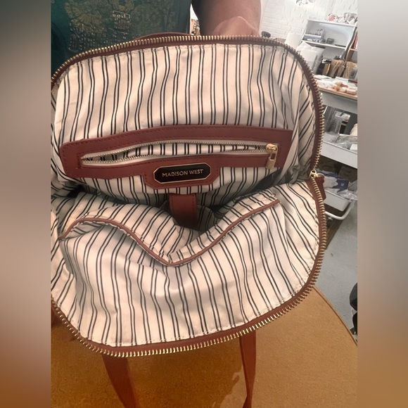 25% off of listed price. Mauve colored backpack. Slightly used. Good condition. - Picture 3 of 4